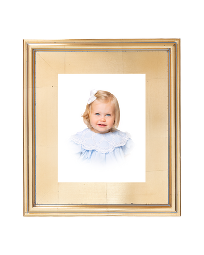 Custom gold frame with an heirloom photo of a young girl with a white background